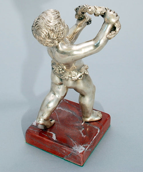 Continental Silver Sculpture of Cherub with Garland of Flowers on Marble Base